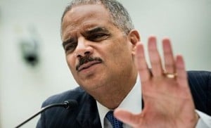 eric_holder_hand_up