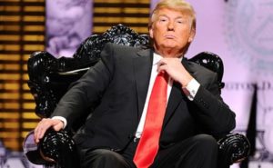 Trump on blk throne