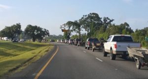 The Acadian Armada lines up on I-12 to launch their relief effort.