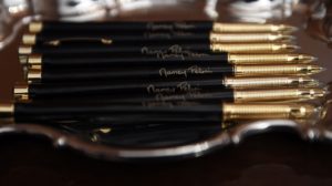 Solemn-Somber-Souvenir-Signature